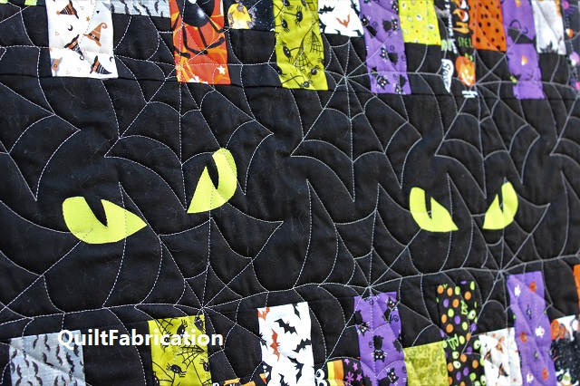 cat eyes on a quilt by QuiltFabrication cat eyes on a quilt by QuiltFabrication