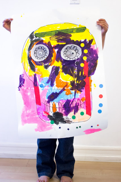 Giant Dia De Los Muertos Skulls:  A fun Process Art Project to celebrate the Day of the dead with kids