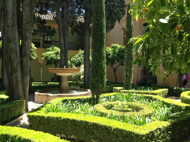 Lush Alhambra courtyard on Semi-Charmed Kind of Life