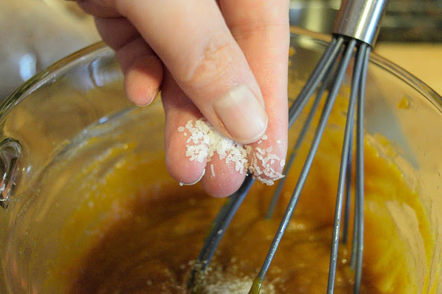 Salt being added to the butter and puree mixture.  