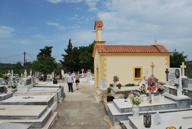 picture of cemetery with man and woman walking
