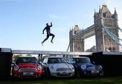 Nigerian UK Olympic Champion Jumps Over 3 CARS 1 Nigerian UK Olympic Champion Jumps Over 3 CARS 1