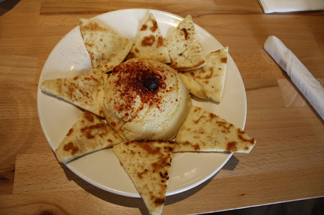 Hummus plate with fresh pita at Grill House in Northbrook