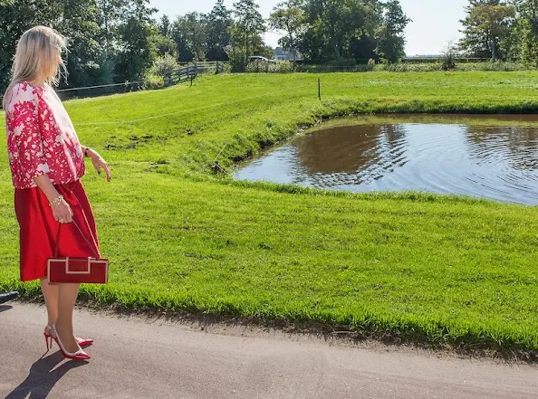 Queen Maxima of The Netherland visits a dairy farm (FrieslandCampina) in Koudum
