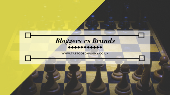 Bloggers Vs Brands superimposed over a chess board