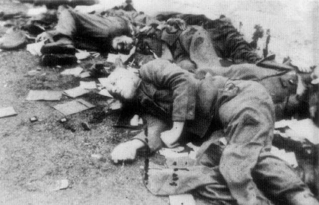 Dead guards at Dachau Holocaust worldwartwo.filminspector.com