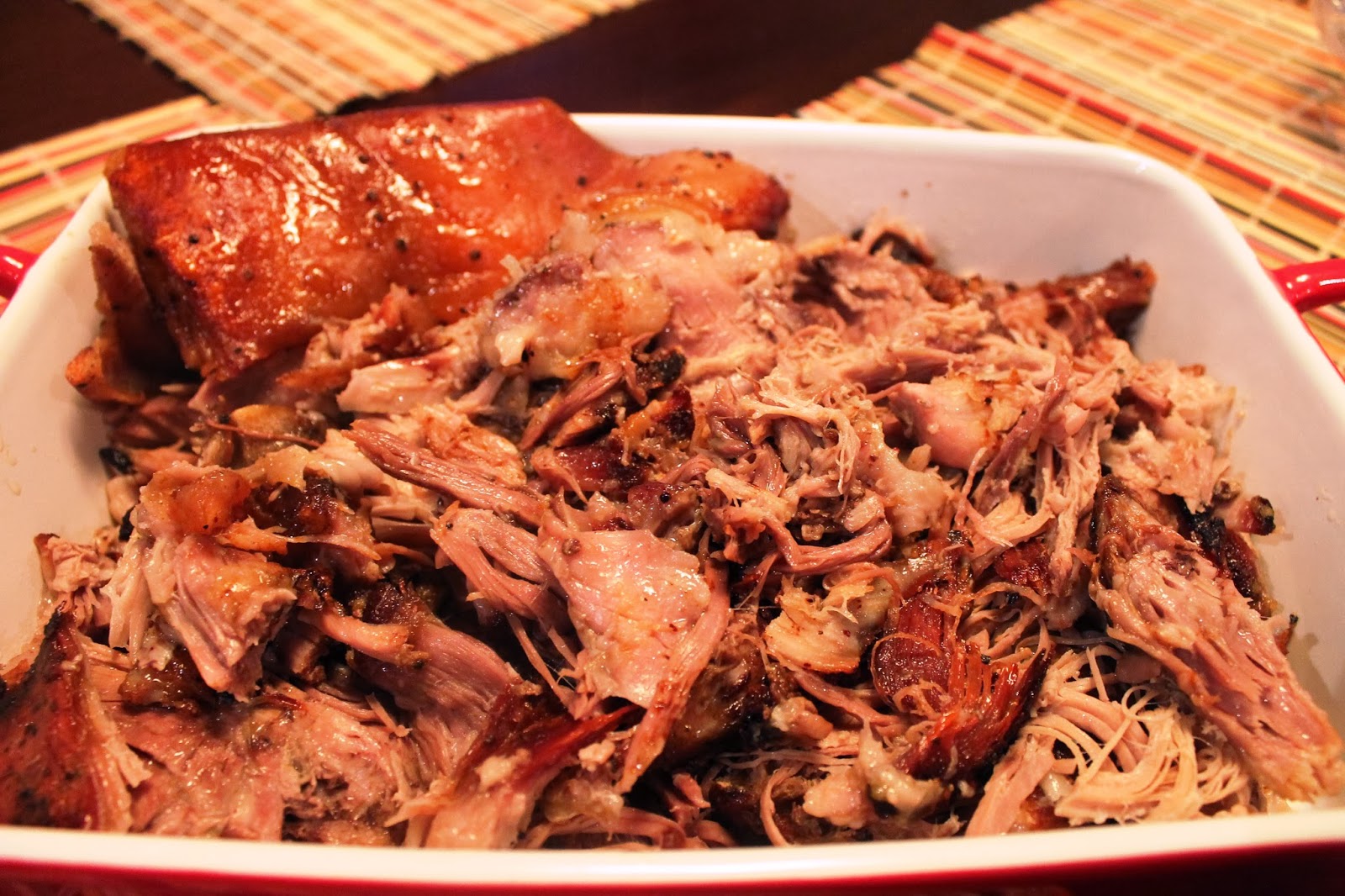 The skin of the pork roast is crispy and the meat is tender and