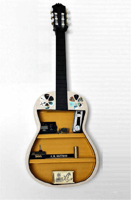 home decor-wall decoration ideas Old guitar you can reuse as a book shelves
