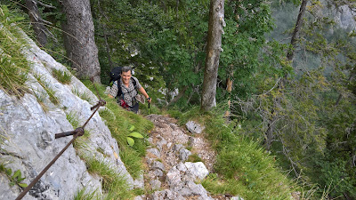 Climbing the Komarča cliff face from Koča pri Savici.