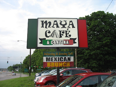 The sign outside of Maya cafe and Cantina