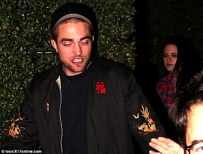 Partying since Twilight? Robert Pattinson looks worse for wear as he