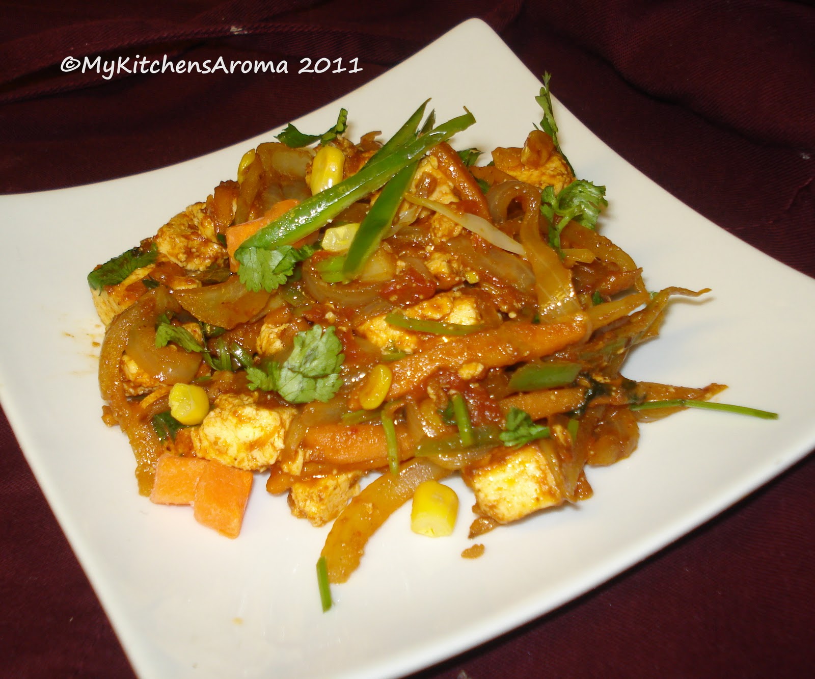 The Sizzling Pan "Fusion Cuisine" Paneer Chili,Grapes and Asiago