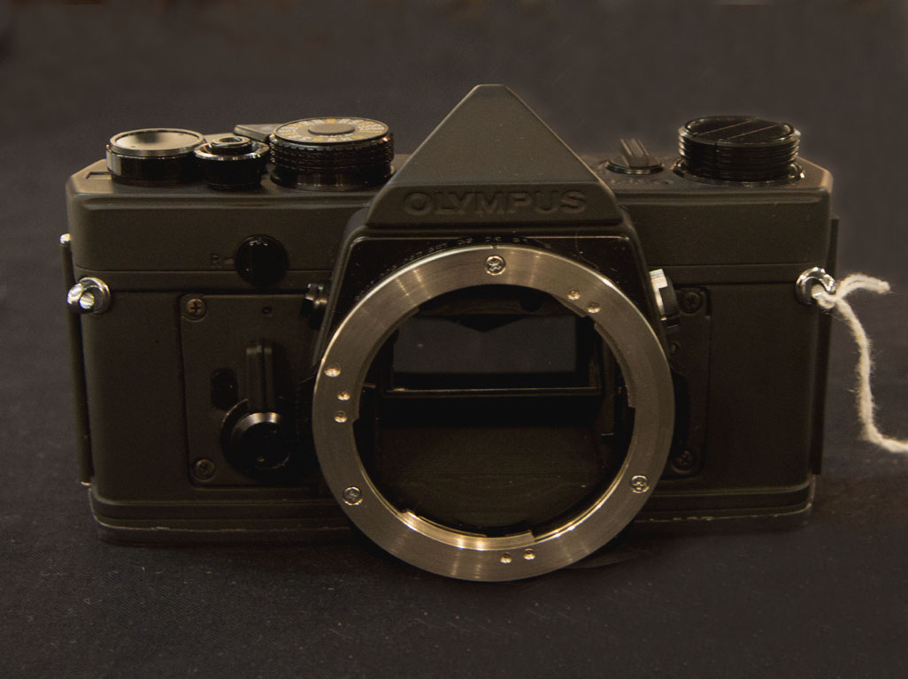 elrectanguloenlamano OLYMPUS OM1 ´ NASA ´ THE AMERICAN AERONAUTICS