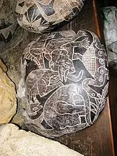 An Ica stone allegedly depicting dinosaurs on Wikipedia.