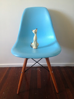 replica Eames moulded plastic dining chair in blue