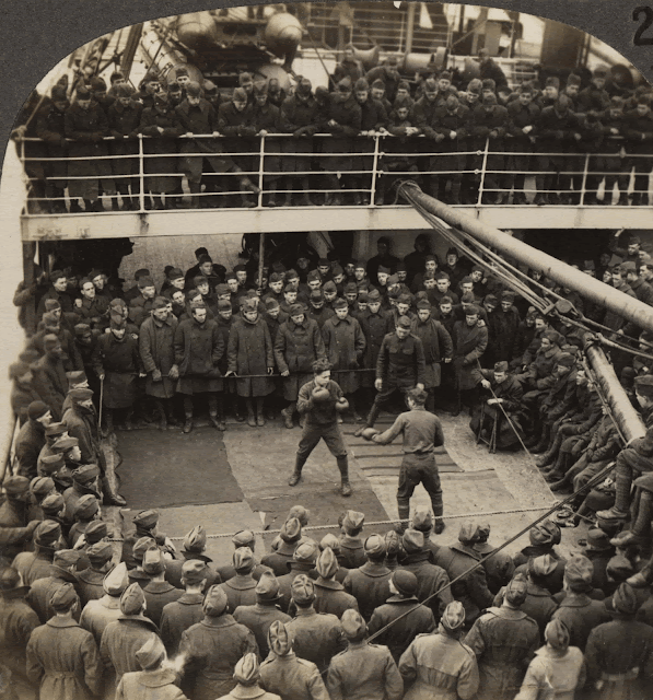 Boxing match between two American troops on board a ship during their