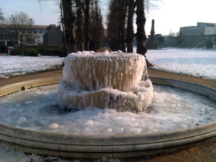 Winter Blast Transforms Water Fountains Into Magical Ice Sculptures