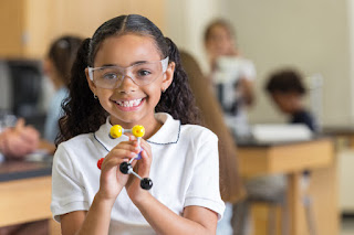 Girl Wearing Safety Glasses ANSI/ISEA Z81.1