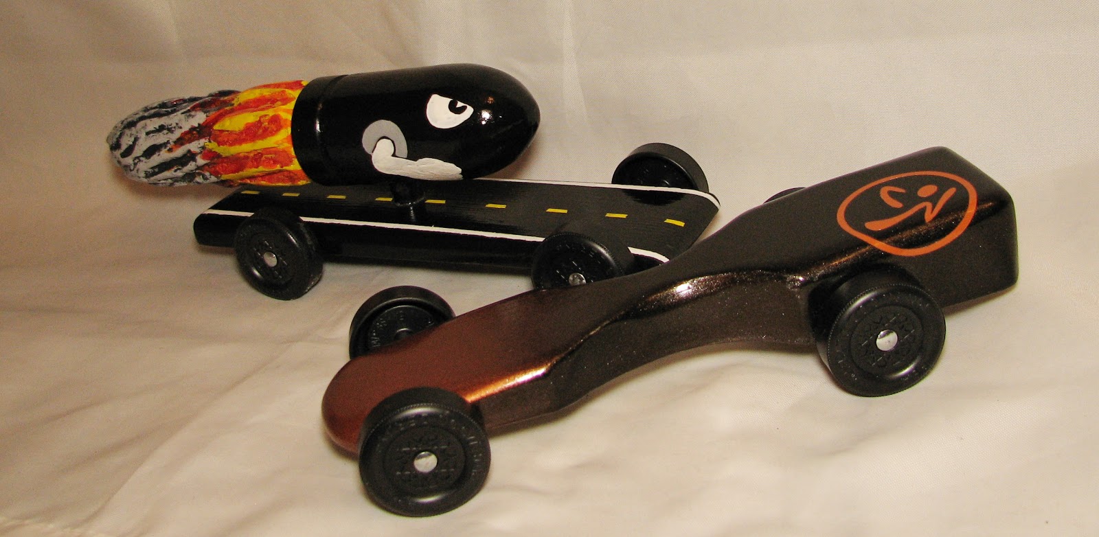 Going's on at the Glenn's Rods and Dogs Pinewood Derby for Adults