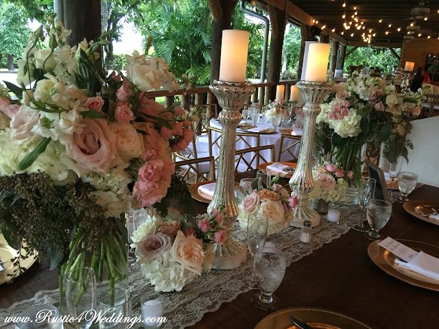 Close-Up of Table Centerpieces and Floral Arrangements Close-Up of Table Centerpieces and Floral Arrangements