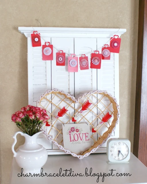 Vintage inspired Valentine's Day vignette with banner and roses