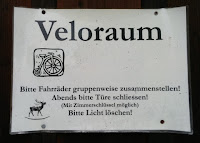 Sign posted on the door to the Veloraum, Hotel Hirschen Ramsen, Switzerland.