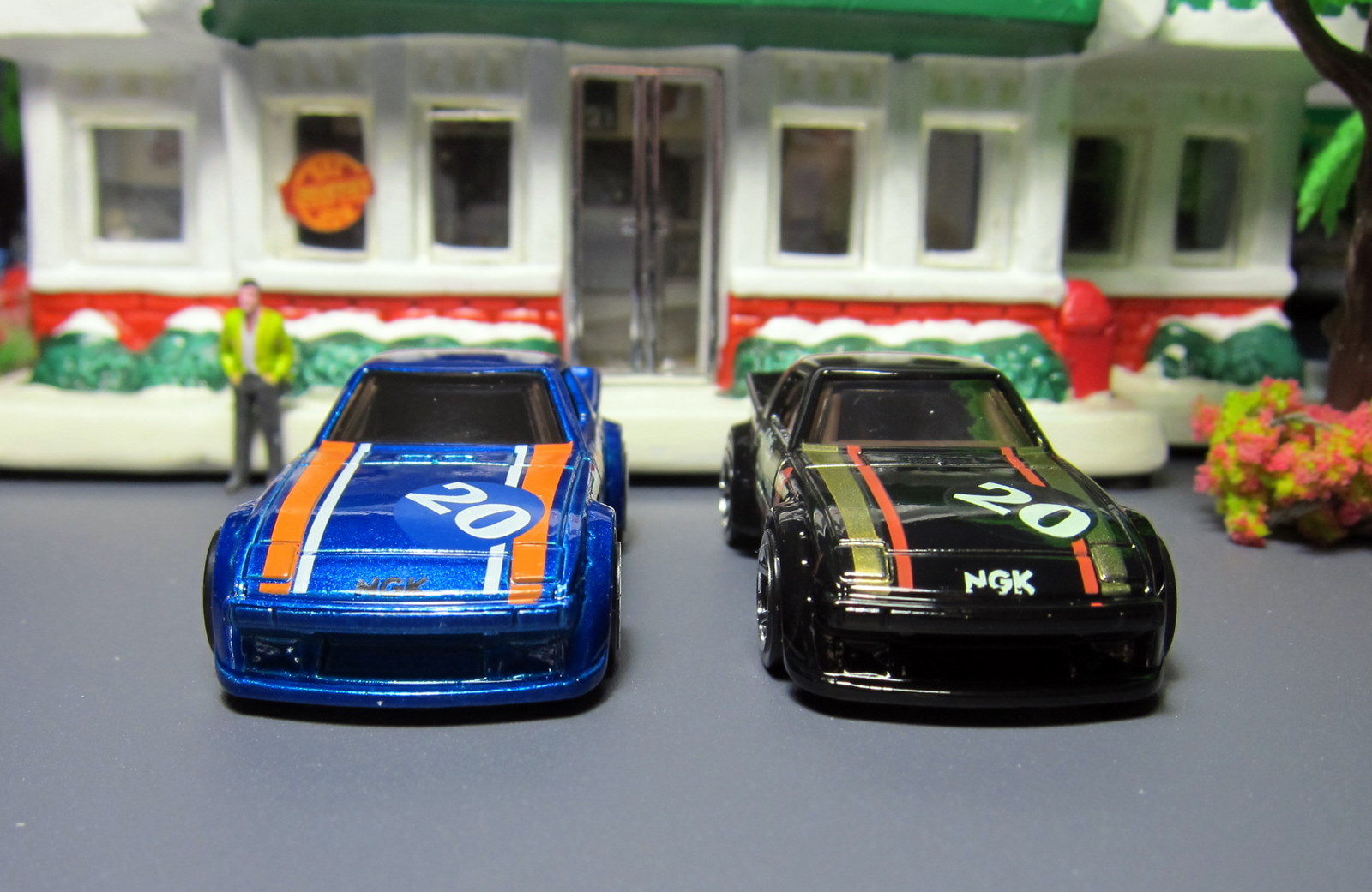 The black Mazda RX 7 is the new 2012 single and the blue one can be found i...