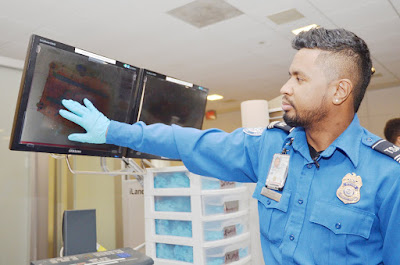 Jonathan Williams is touching sreen monitor image Jonathan Williams is touching sreen monitor image