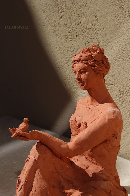 Woman with a Small Bird, details. Sarah Myers. woman, sculpture, art, bird, escultura, arte, terracotta, sarah, myers, red, clay, earthenware, sitting, seated, small, tanagra, classical, contemporary, kunst, skulptur, quick, lady, finch, graceful, head, hand, expression
