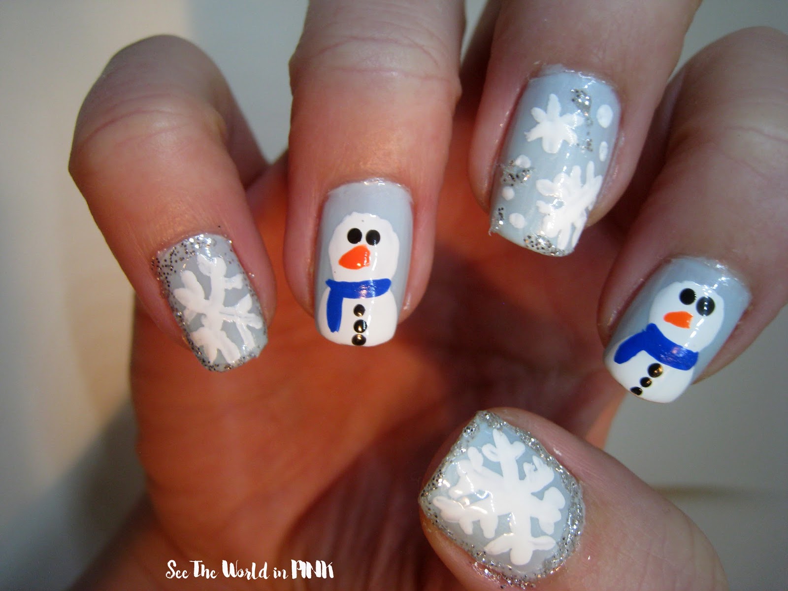 snowman and snowflake nail art