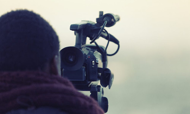 videogrpapher and camera