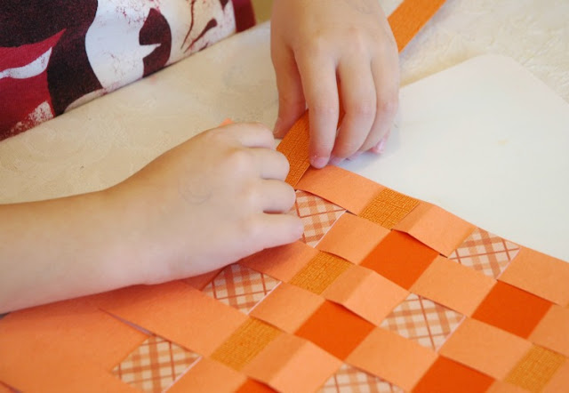 Halloween craft for kids, fine motor paper weaving jack-o-lantern