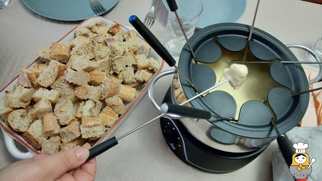 Receta tradicional suiza de fondue de queso