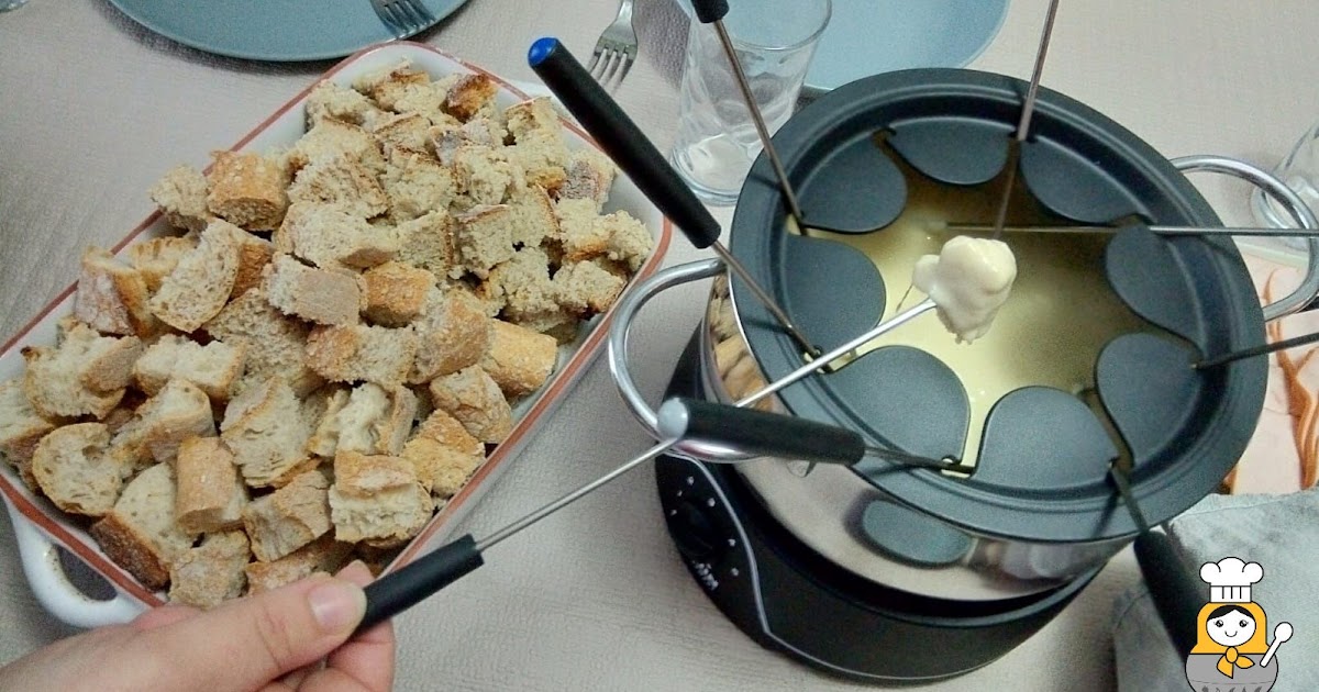 Receta tradicional suiza de fondue de queso Vuelta y Vuelta