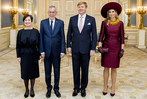 Queen Maxima's new claret red dress are from the 2018 collection of Belgian fashion house Natan. Queen wore her claret red coat by Natan