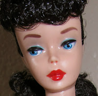 I'm also a vintage Barbie doll collector!   Check out my site: