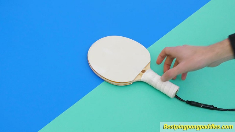 ping-pong-paddles-in-hand.jpg