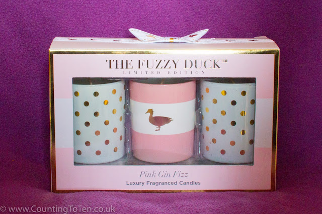The Fuzzy Duck Pink Gin Fizz Trio Candle Set in the box