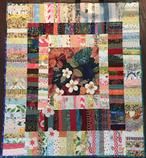 Medallion Chinese Coins quilt IV made of scraps with applique flowers