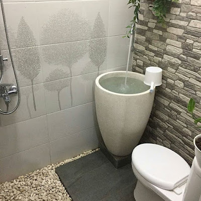 desain kamar mandi dengan batu alam