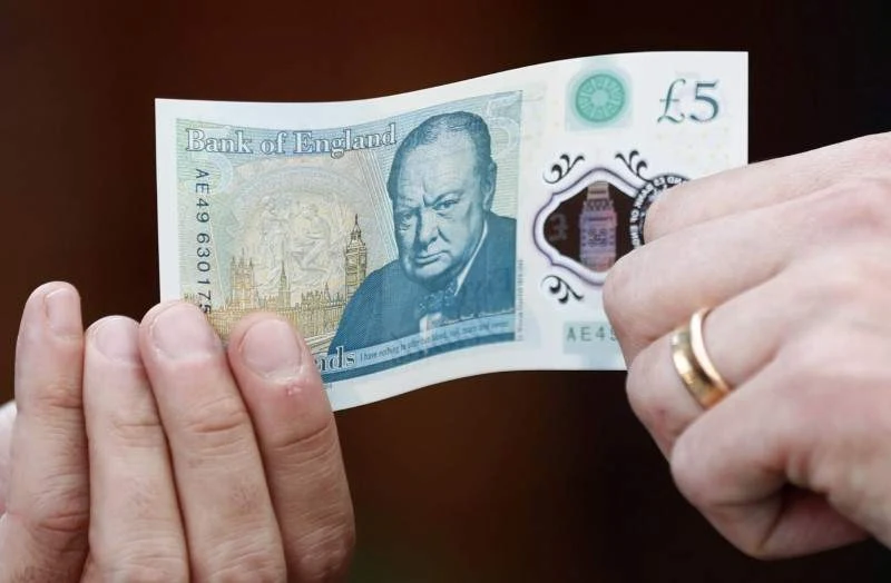 UK to continue using animal fat traces in new bank notes, despite protests by Hindus and others