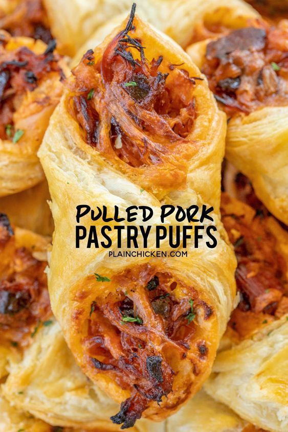 Pulled Pork Pastry Puffs - only 4 ingredients! Great recipe for a quick lunch, dinner or party. Smoky pulled pork tossed with BBQ sauce and cheese then baked in puff pastry. SO good! Can make ahead and freeze for later. We love to serve these with some coleslaw and extra BBQ sauce or Ranch for dipping. YUM! #pulledpork #partyfood #appetizer #tailgating Pulled Pork Pastry Puffs - only 4 ingredients! Great recipe for a quick lunch, dinner or party. Smoky pulled pork tossed with BBQ sauce and cheese then baked in puff pastry. SO good! Can make ahead and freeze for later. We love to serve these with some coleslaw and extra BBQ sauce or Ranch for dipping. YUM! #pulledpork #partyfood #appetizer #tailgating