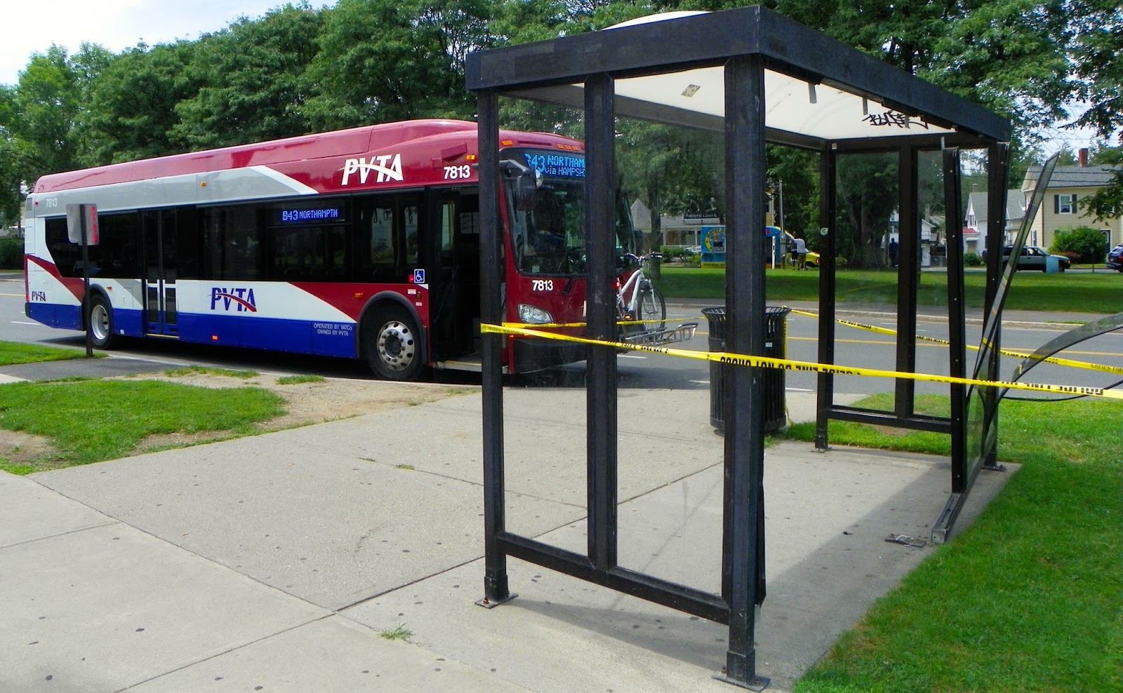 Only in The Republic of Amherst Car vs Bus Stop