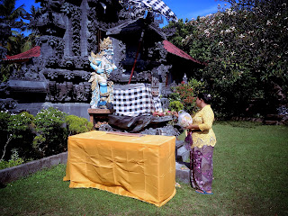 Giving Offerings To God At Dalem Temple In The Holy Kuningan Day Ringdikit Village