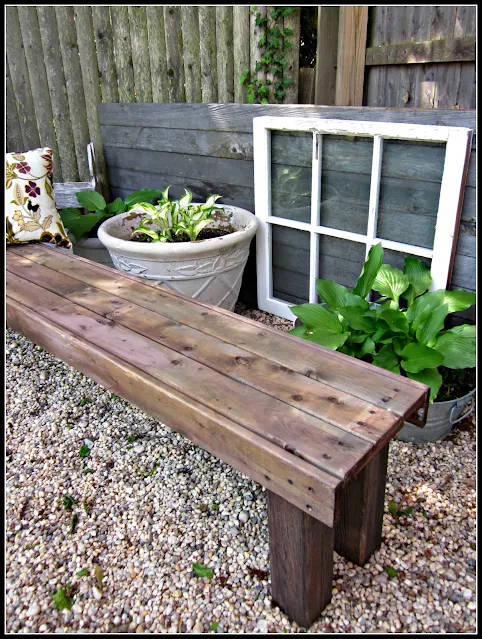 Bench in pea gravel garden