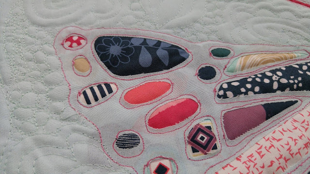Reverse applique butterfly mini quilt