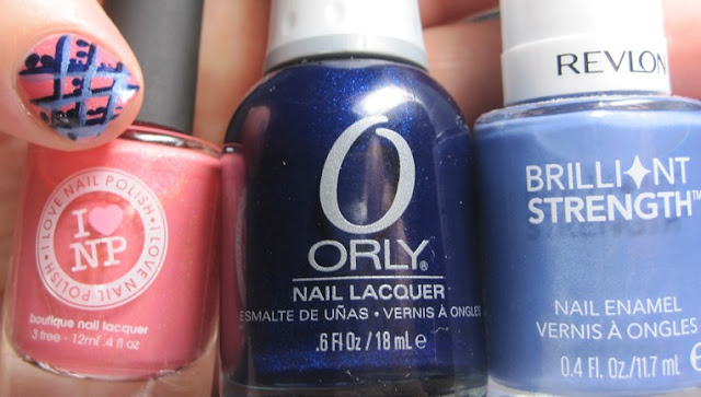 Bottle shot:  I Love Nail Polish Grande Sunset, Orly In The Navy, and Revlon Intrigue