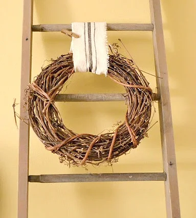 ladder with grapevine wreath