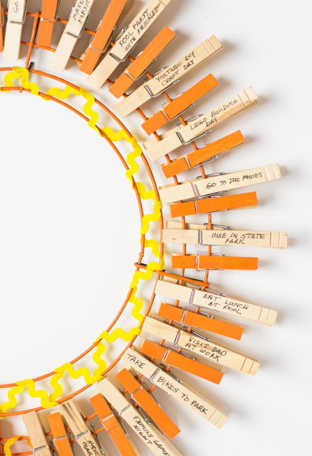 Make a summer bucket list wreath out of clothespins! It turns into a sunshine when you have crossed everything off your list! Make a summer bucket list wreath out of clothespins! It turns into a sunshine when you have crossed everything off your list!