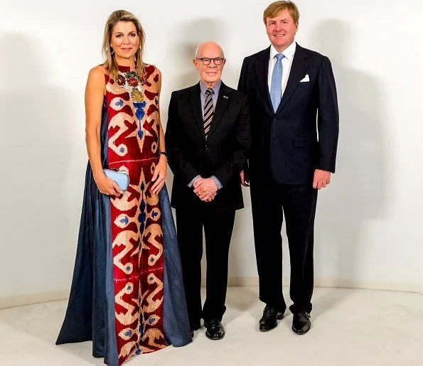 Queen Maxima wore Gianvito Rossi Lola frayed denim sandals and carried Bottega Veneta Knot satin and snakeskin clutch